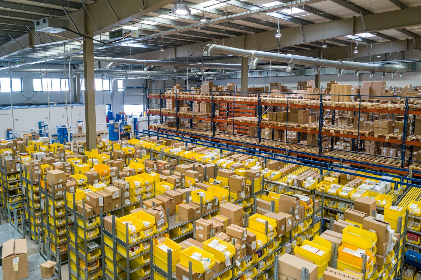 Warehouse shelves stocked with components and parts